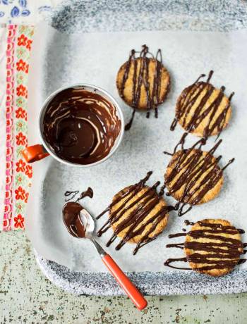 Apricot and almond bumbles with dark chocolate drizzle