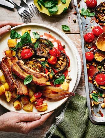 Pork belly with roasted aubergine and tomatoes