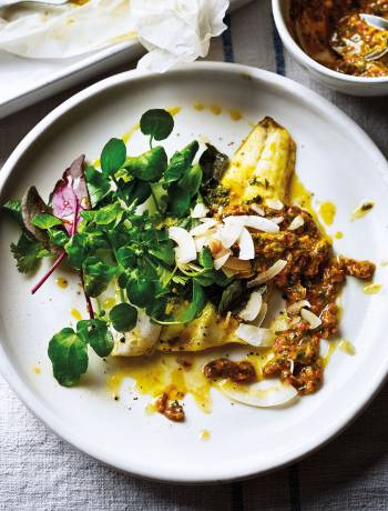 Herb-crusted sea bass with toasted coconut and tomato dressing