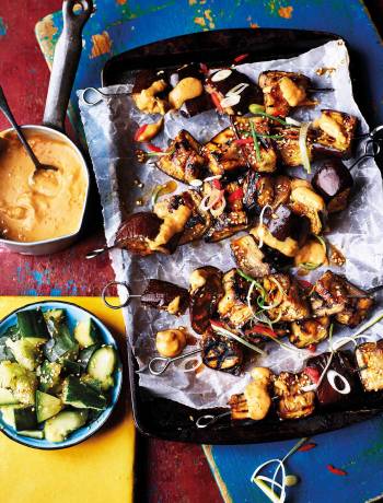 Aubergine skewers with satay sauce and smashed cucumber