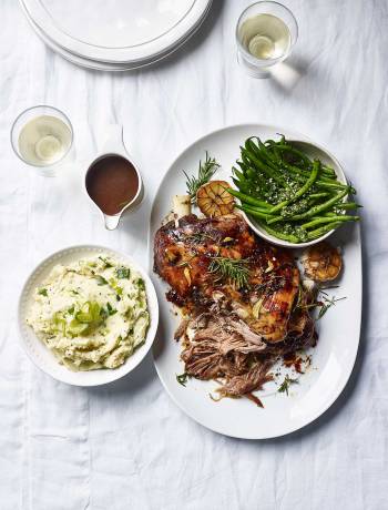 Slow-roasted lamb with spring onion mash and pistou 