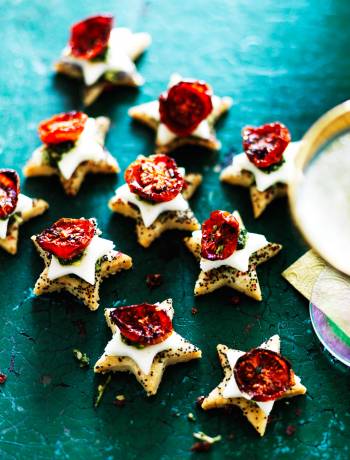 Parmesan shortbreads with mozzarella, cherry tomatoes and pesto