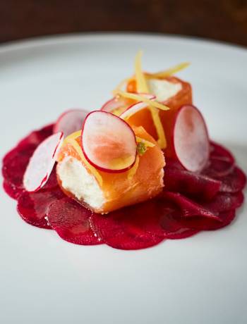 Smoked salmon with goats' cheese, lemon mousse and beetroot carpaccio