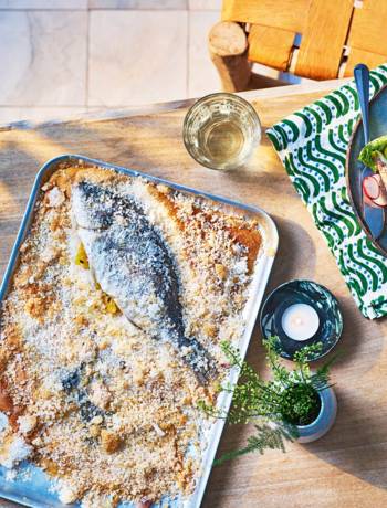 Salt-baked bream with pickled radish and pea salad