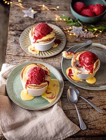 Christmas pudding soufflé with cranberry sorbet and brandy anglaise