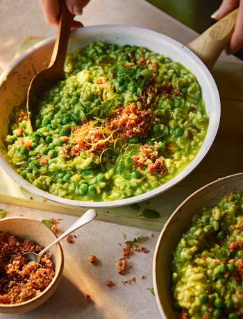 Pea risotto with bacon and hazelnut crumb