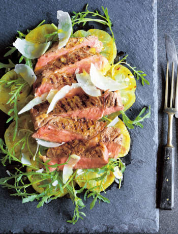 Steak tagliata with yellow tomatoes, oregano and mustard