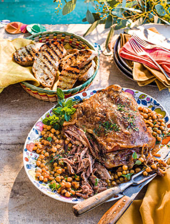 Braised shoulder of lamb with chickpeas, onions, garlic and oregano
