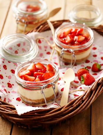 Individual strawberry and cream cheesecakes
