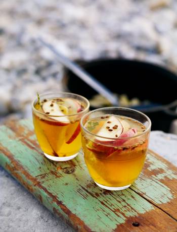 Hot toddy with bay leaves and orange