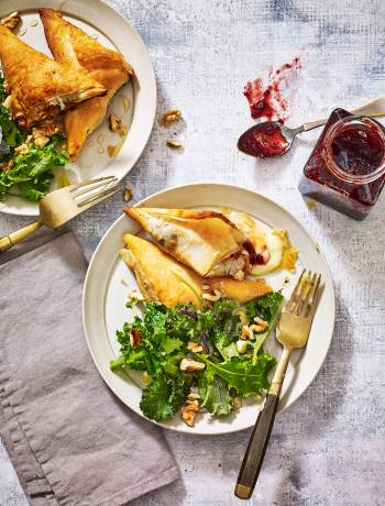 Cheese and cranberry parcels with baby kale salad