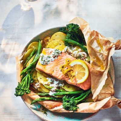 Zesty salmon parcels with dill sauce