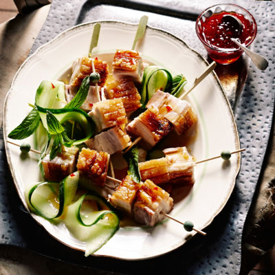 Crispy pork belly skewers with chilli garlic caramel dipping sauce