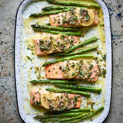 Salmon traybake with lemon butter and asparagus