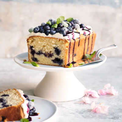 White chocolate and blueberry loaf cake with cheesecake frosting