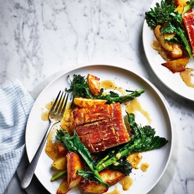 Slow-roast pork with rosemary potatoes and sprouting broccoli
