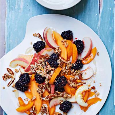 Breakfast fruit salad with pecan granola