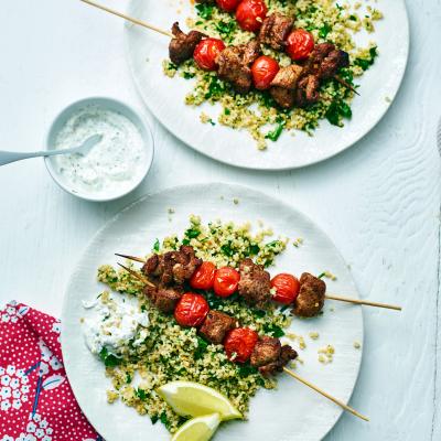 Spicy lamb skewers with herby bulgur