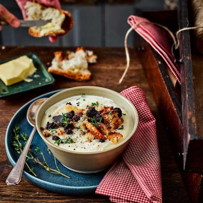 Maple-roasted celeriac and parsnip soup with black pudding crumbs