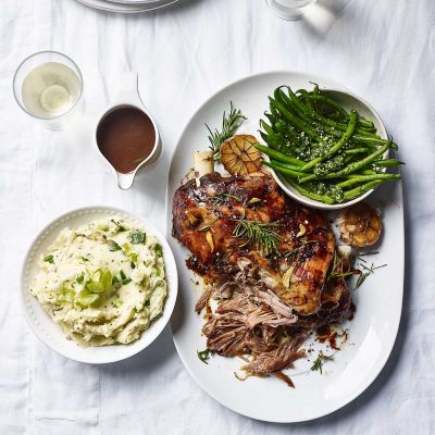 Slow-roasted lamb with spring onion mash and pistou