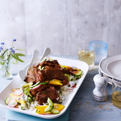 Indian-spiced lamb chops with mango and cucumber salad