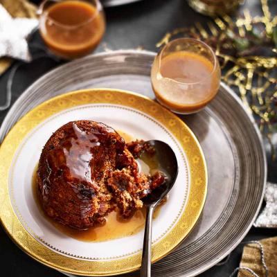 Gluten-free mini Christmas puddings with spiced toffee sauce