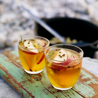 Hot toddy with bay leaves and orange