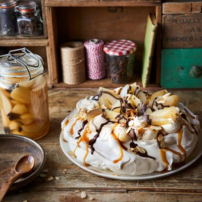 Pavlova with spiced pears and salted caramel sauce