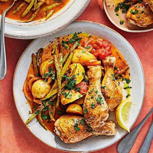 Fasolakia with lemon and herb chicken drumsticks