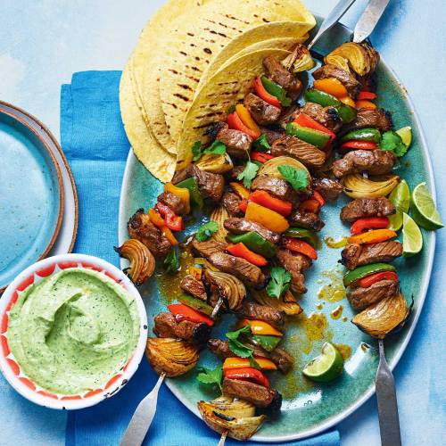 Steak fajita skewers with a creamy guacamole dip