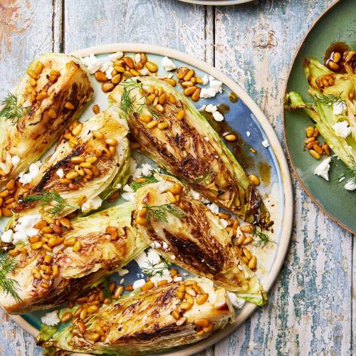 Charred cabbage with spicy brown butter, pine nuts and feta