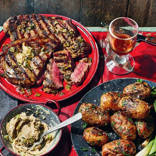 Steak with roasted garlic and burnt spring onion butter