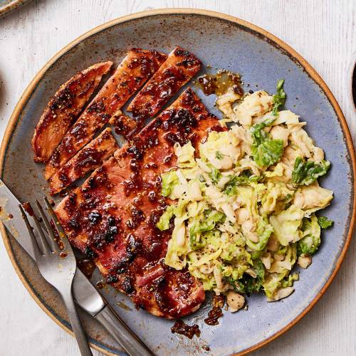 Chutney-glazed gammon steaks with white bean colcannon