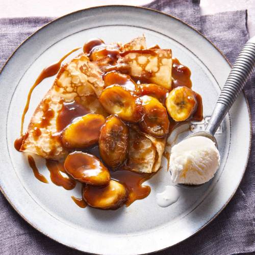 Pancakes with boozy butterscotch bananas    