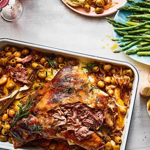 Lamb shoulder, caramelised onions and olives with buttered asparagus