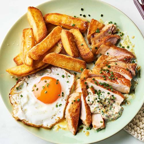 Best oven chips with pork chops and fried eggs