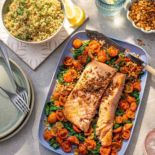 Roast salmon with tomatoes and almond pangrattato