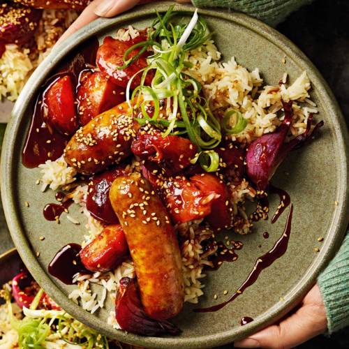 Five-spice sausages with sticky plums