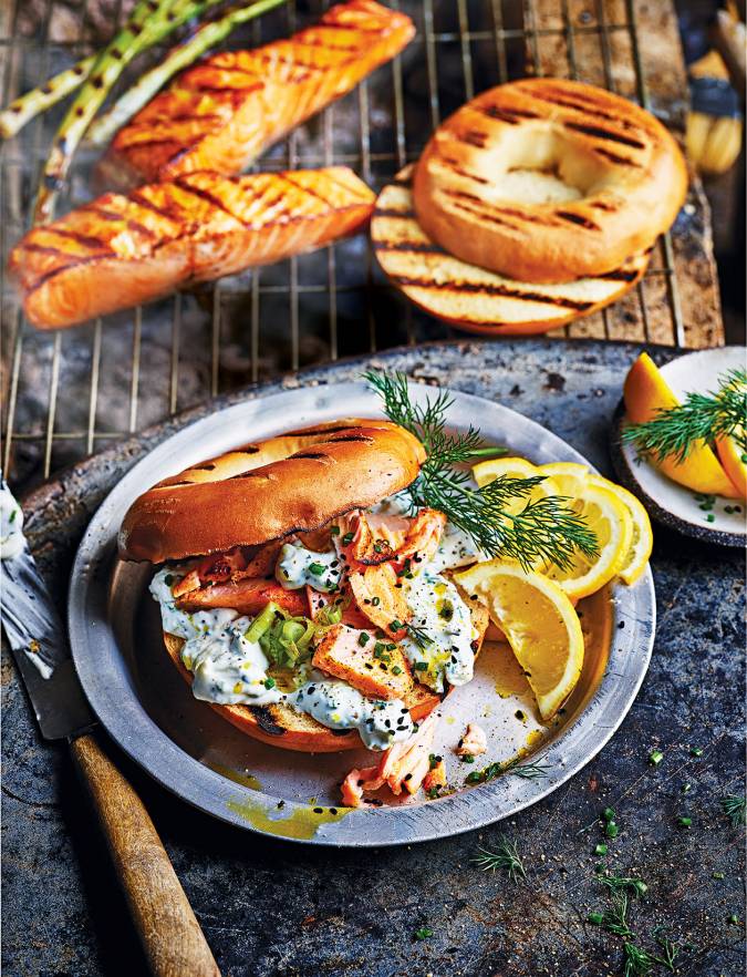 BBQ Hot smoked salmon bagels with spring onion and herb soft cheese