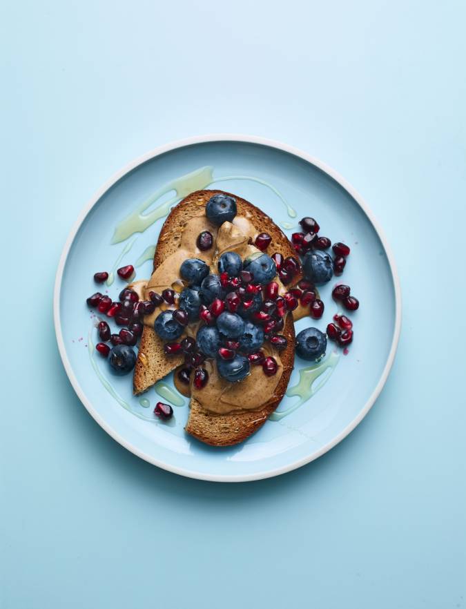 Recipe: Nut butter on toast with blueberries and pomegranate
