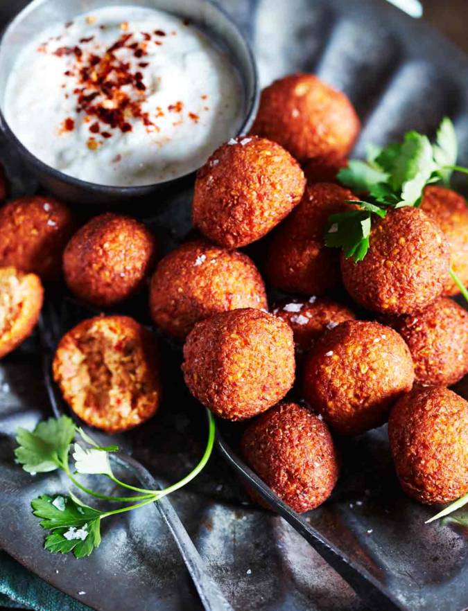 Recipe: Fragrant spiced red pepper falafel with smoky yogurt dip