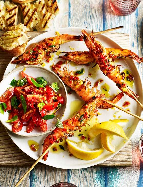Recipe: Lemony prawn skewers with tomato, chilli and oregano