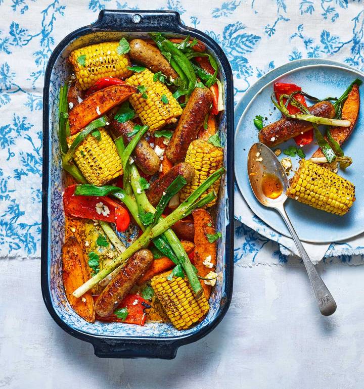 Cajun-spiced veggie-sausage traybake