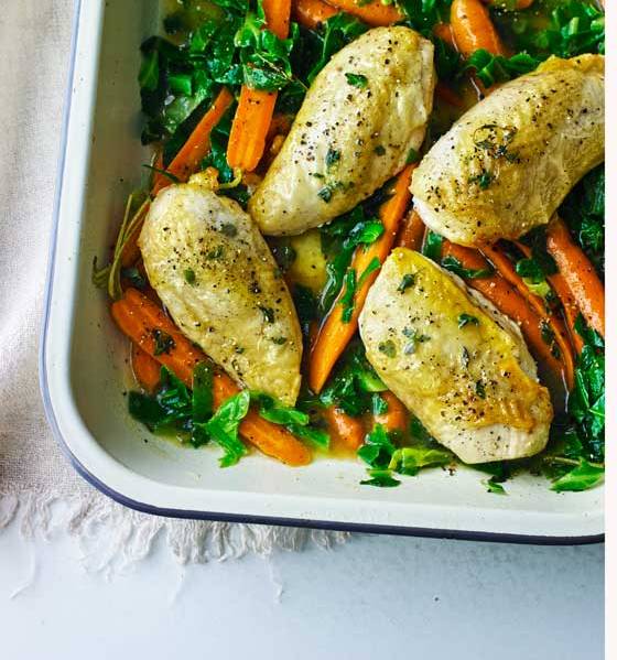 Orange roasted chicken with spring vegetables