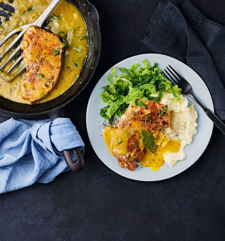 Milk-braised pork steaks with cabbage