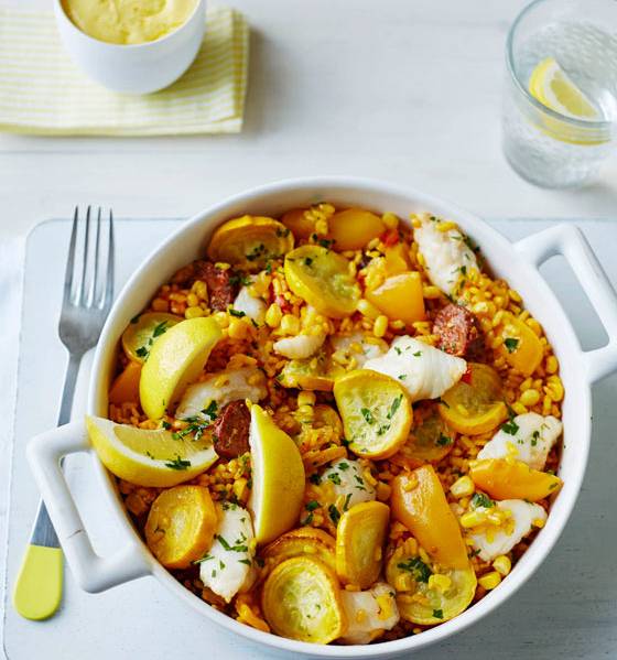 Monkfish, chorizo and vegetable paella with saffron aioli