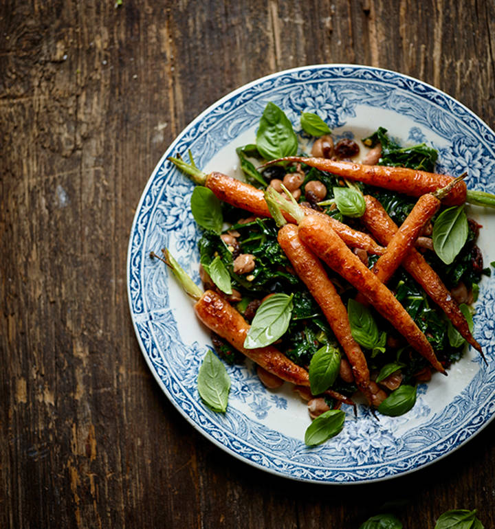 Warm carrot salad with spicy raisin and pine nut dressing