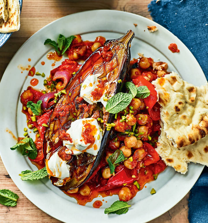 Roasted harissa aubergines with tomato, red pepper and chickpea stew