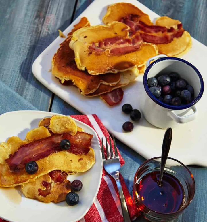 Bacon pancakes with maple syrup and blueberries