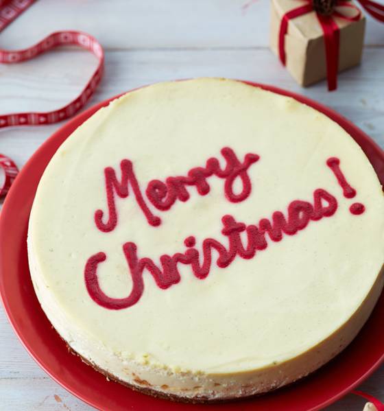 Merry Christmas white chocolate and cranberry cheesecake